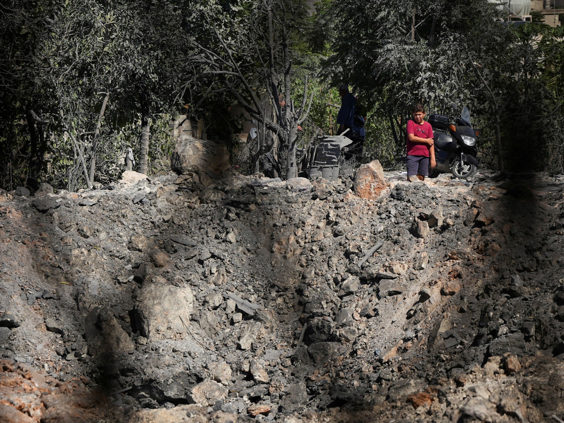 As Israel admits to combat losses in southern Lebanon while deploying civilian contractors to demolish infrastructure, the obituary form becomes a framework for understanding how modern warfare erases both bodies and the conditions that sus…