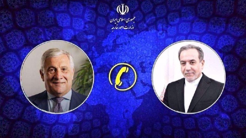 A graphic displays two circular portraits of men in suits separated by a phone icon, set against a blue patterned background featuring Persian text and an emblem at the top.