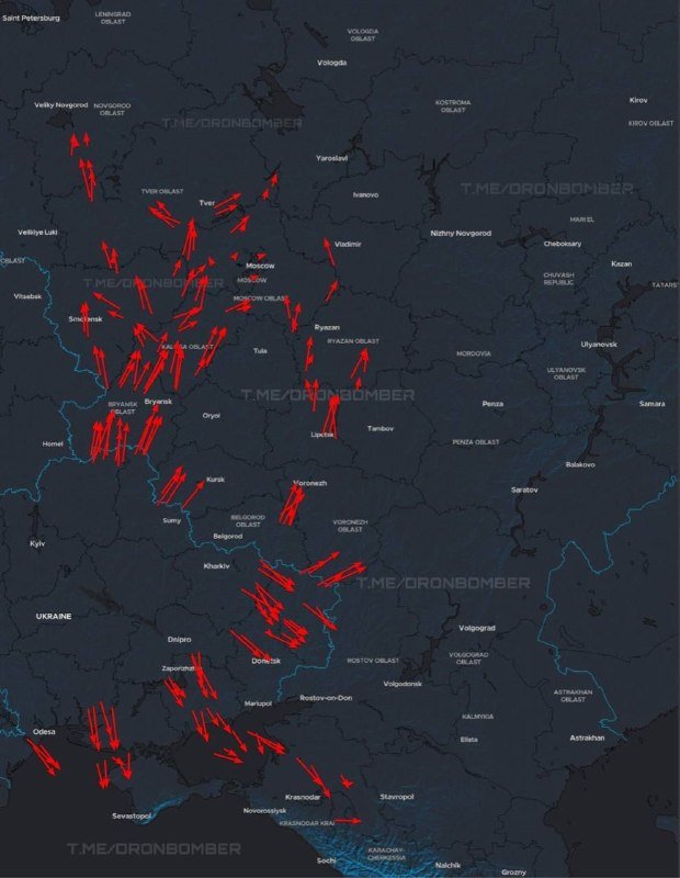 A dark map of Russia and Ukraine displays numerous red arrows indicating movement or strikes, concentrated heavily along the Ukraine-Russia border region, watermarked "T.ME/DRONBOMBER."