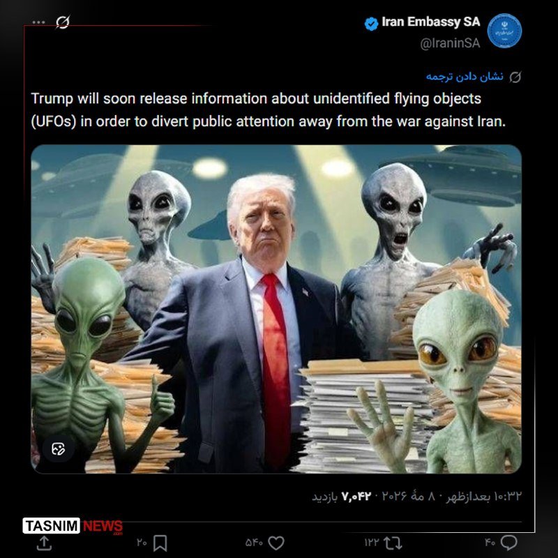 A digital illustration depicts a man in a dark suit and red tie surrounded by gray aliens amid stacks of paperwork, posted by Iran Embassy SA on social media.