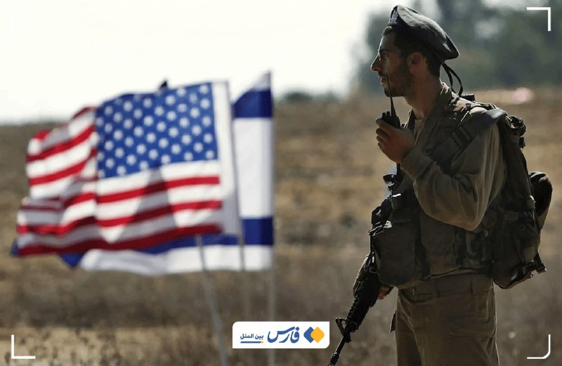 A soldier in military gear holding a rifle stands in a field, speaking into a radio, with American and Israeli flags visible in the background.