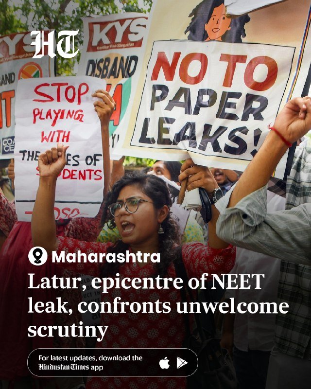 Protesters raise placards reading "NO TO PAPER LEAKS!" and "STOP PLAYING WITH THE LIVES OF STUDENTS" during a demonstration.