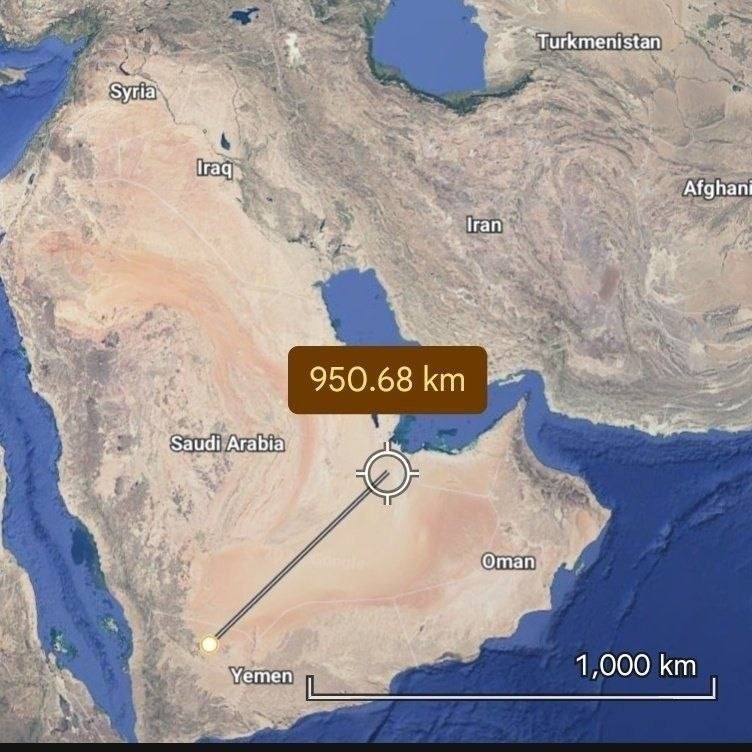 Satellite map of the Middle East displays a measured distance of 950.68 km between two marked points in Yemen and near the Persian Gulf, with surrounding countries labeled.