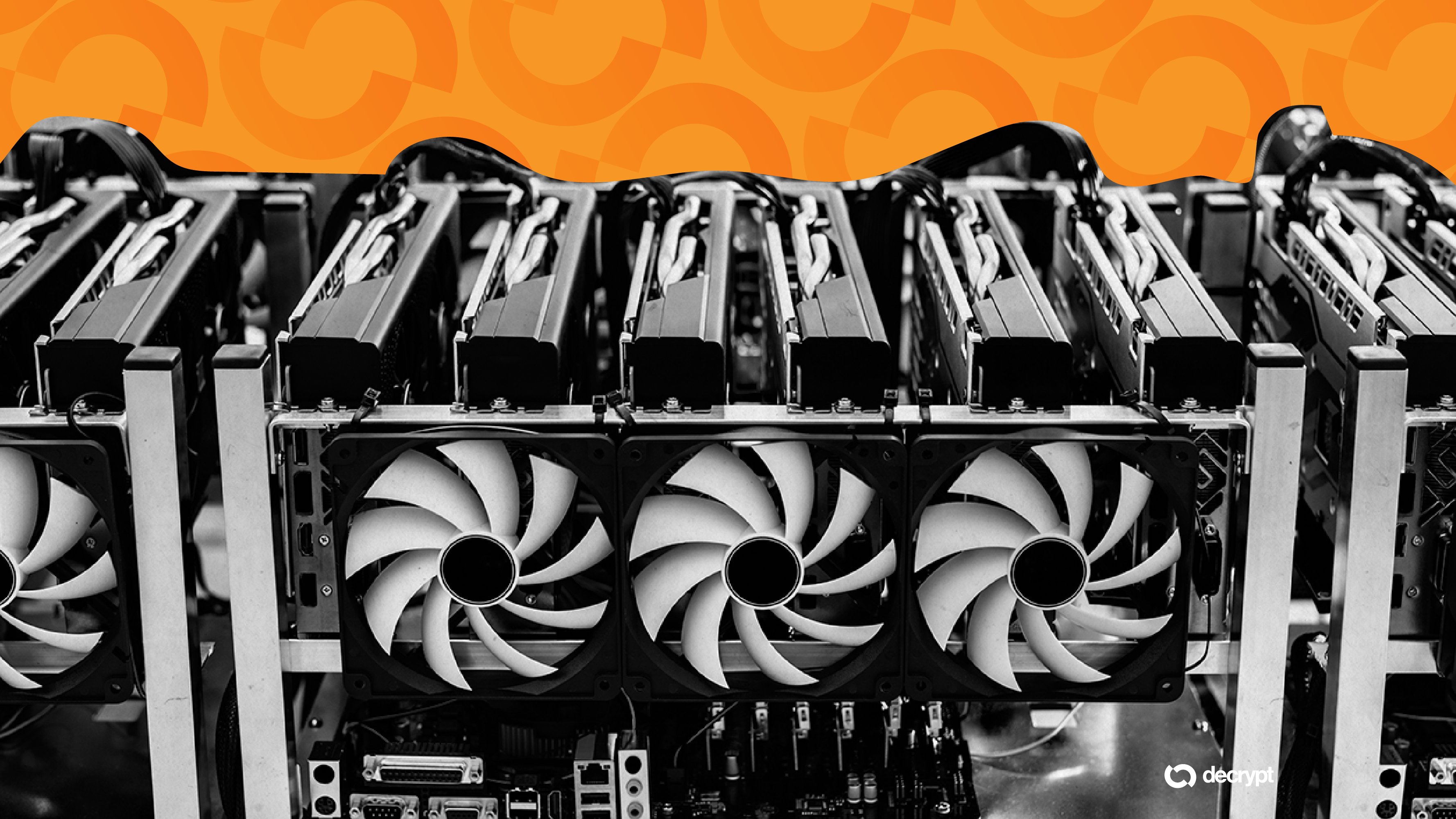 A row of cooling fans sits mounted in a metal server mining rig, with an orange graphic overlay and a "decrypt" logo in the corner.
