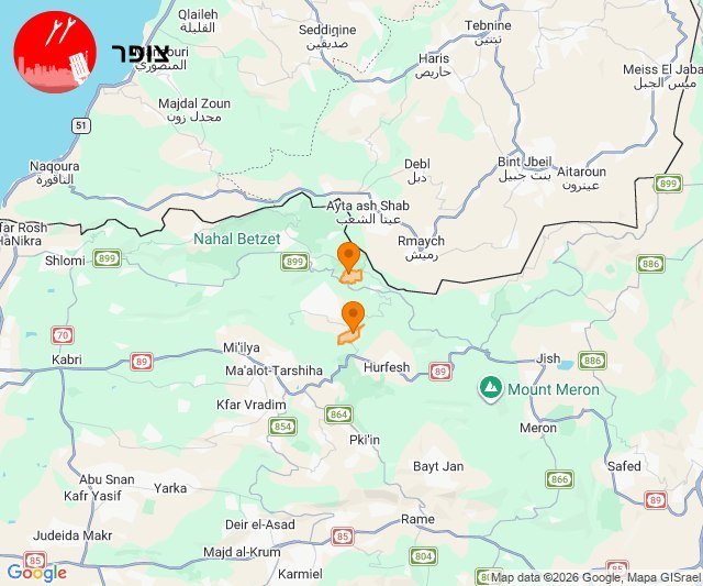 A digital map of northern Israel displays two orange location pins near Ayta ash Shab and Hurfesh, with Hebrew text and a red logo visible in the corner.