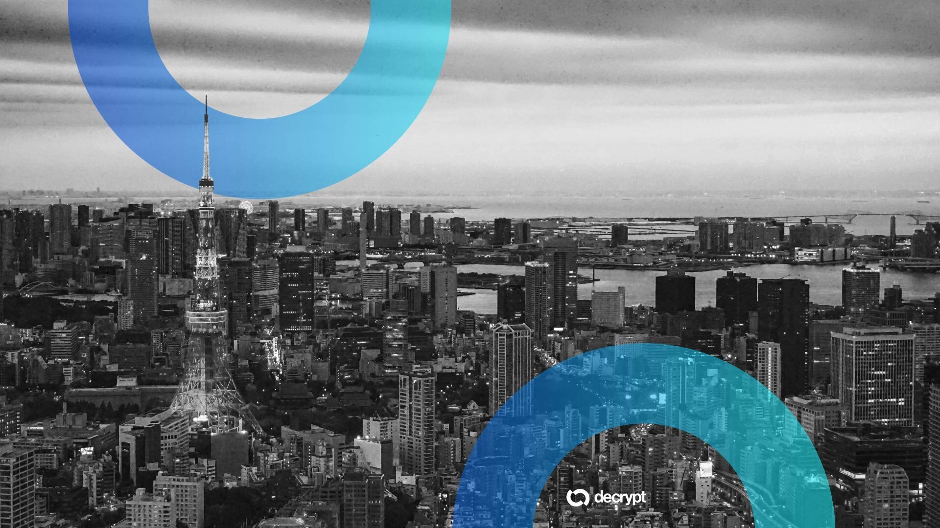 Black-and-white aerial cityscape featuring a tall lattice tower, dense skyscrapers, and a bay, overlaid with blue and teal curved graphic elements and a "decrypt" logo.