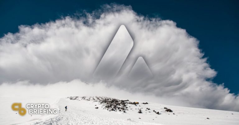 A large Avalanche logo is superimposed over an image of a lone figure walking across a snowy mountain ridge beneath a massive white cloud.