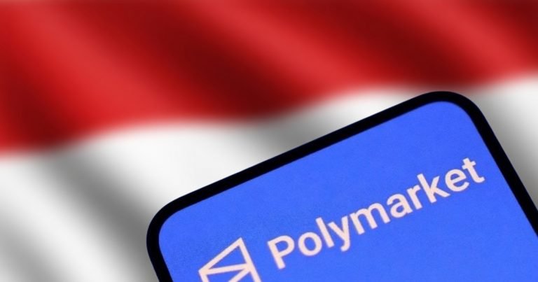 The Polymarket logo and name appear on a smartphone screen in front of a blurred red and white flag.