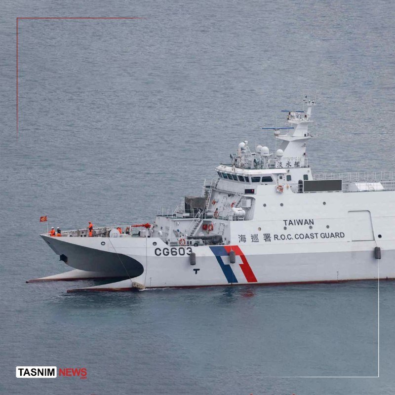 A white Coast Guard vessel marked "TAIWAN R.O.C. COAST GUARD" and "CG603" floats on open water, with crew members in orange vests visible on deck.