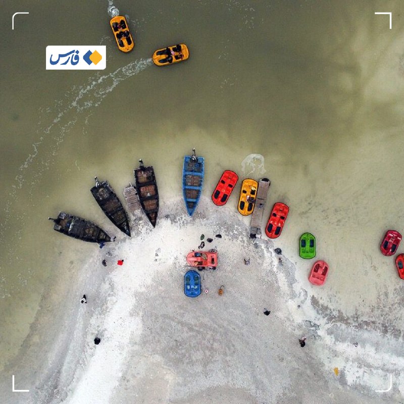 Dried lakebed and stranded boats on the margins of Lake Urmia in northwest Iran.