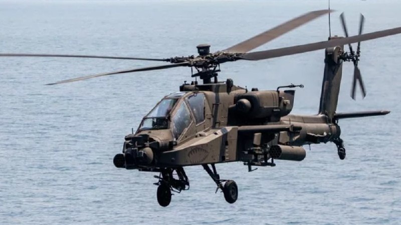 A frame from Tasnim's pooled video of the 9 June 2026 Strait of Hormuz helicopter incident, shared via the Tasnim Plus Telegram channel.