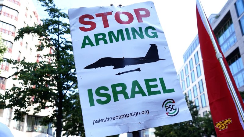 Demonstrators near the access roads to the ILA Berlin aerospace exhibition, 10 June 2026.