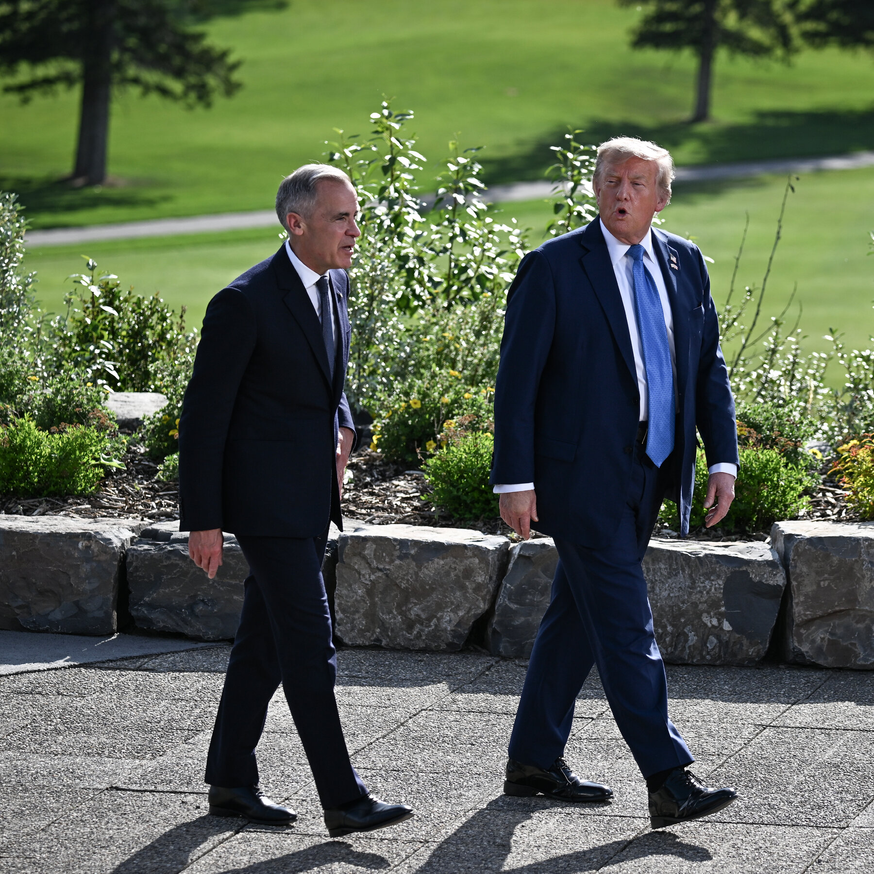 President Trump speaks to reporters at the White House as trade talks with Canada and Mexico enter a sensitive phase.