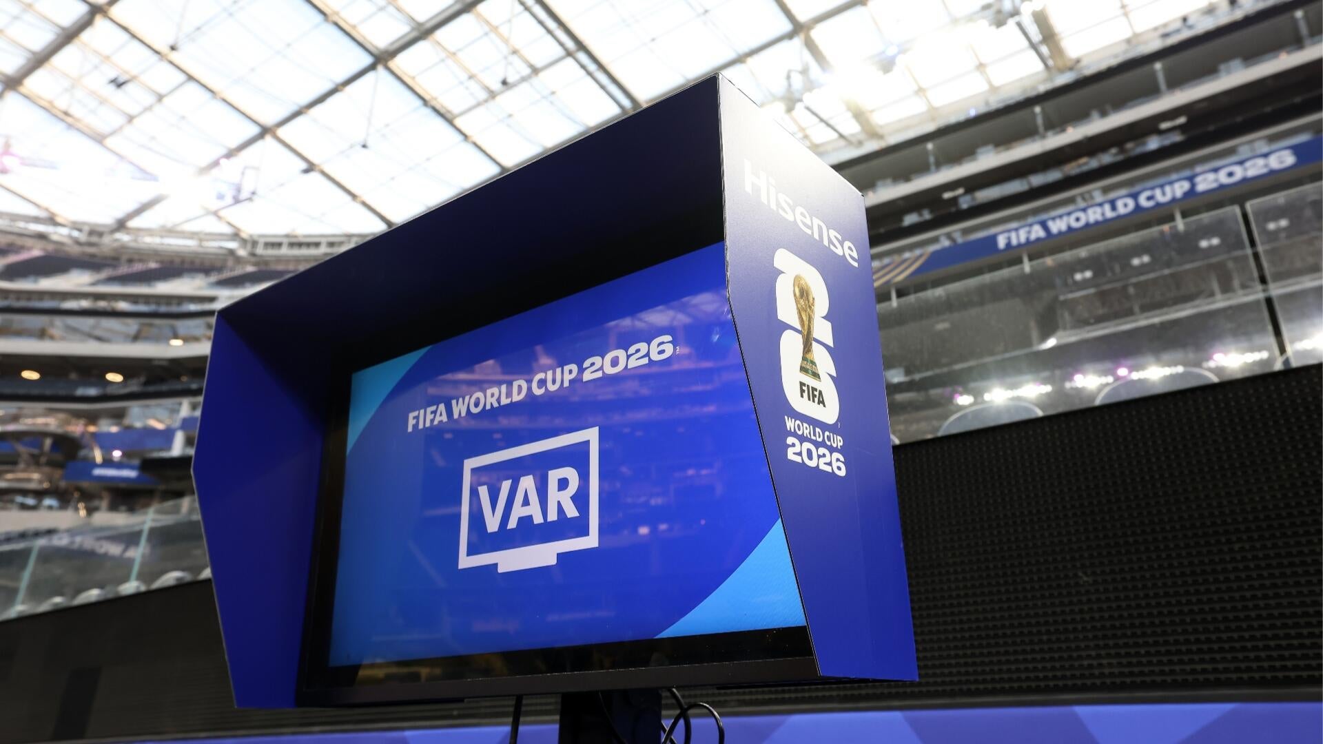 Video assistant referee (VAR) monitor at a FIFA World Cup match venue.