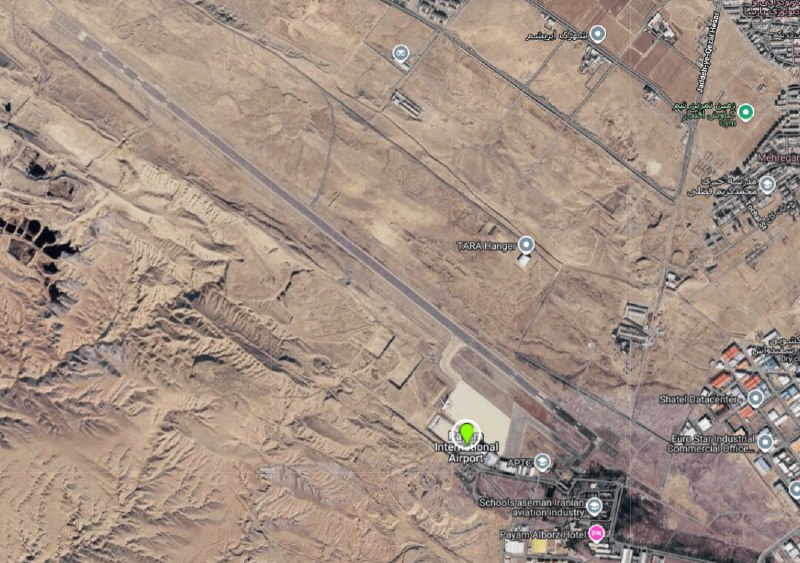 Smoke rises over northern Iran after reported US airstrikes on Karaj in the early hours of 11 June 2026.
