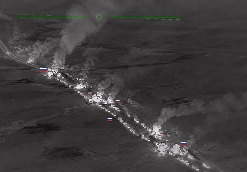 A still from open-source channels circulating 12 June 2026, claimed to show a burning Russian logistics column near Armyansk in occupied Crimea; the image has not been independently verified.