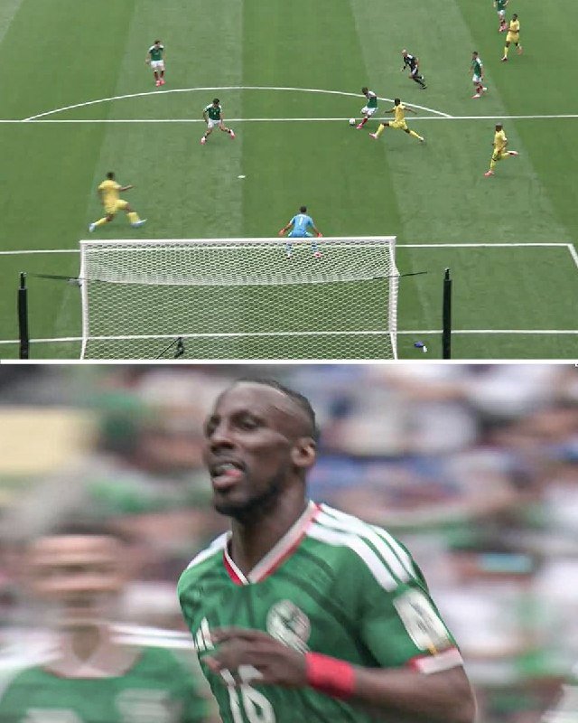 Two soccer players in blue jerseys celebrate exuberantly in front of a goal net, while opposing players in orange jerseys react with frustration behind them.