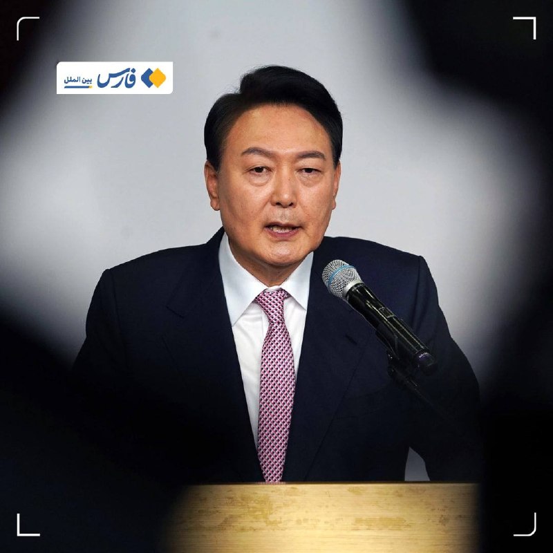 Former South Korean president Yoon Suk Yeol departs a Seoul courthouse under escort.