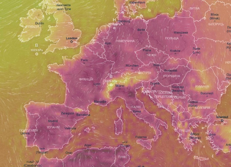 A color-coded weather map of Europe displays purple and pink hues across central and southern regions, with yellow-green shading over the UK and Ireland, and marked cities including London, Paris, and Berlin.