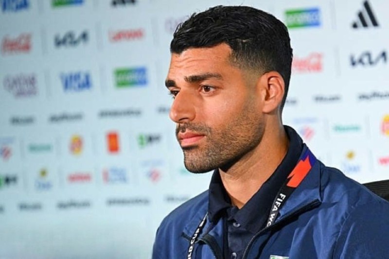 A pre-match press conference in Auckland, three Iranian outlets, and a single repeated line about "uniting the civilized country of Iran" — what the framing tells us about who is allowed to address whom, on the eve of a World Cup cycle.