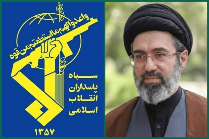 Multiple silhouetted oil pumpjacks operate across a snow-covered field under a hazy sky.