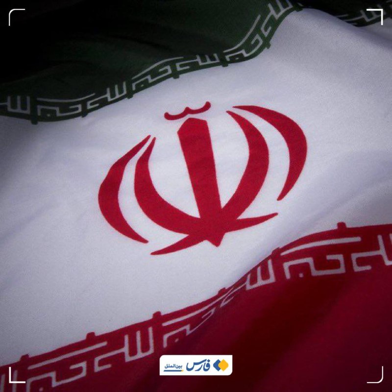 Several missiles with white nose cones are displayed in the foreground against an Iranian flag backdrop, with a news logo in the upper left.