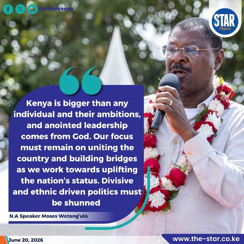 A man wearing glasses and a red-and-white flower garland speaks into a microphone beside a pull-quote attributed to N.A Speaker Moses Wetang'ula, dated June 20, 2026.