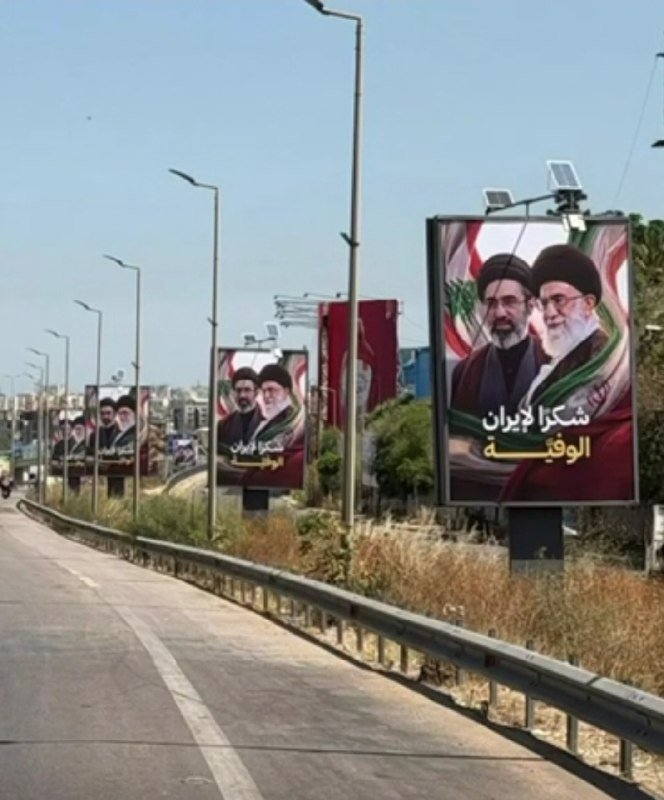 A screenshot of a social media post by "Treasury Secretary Scott Bessent" stating Iran committed to free transit in the Strait of Hormuz, with Treasury issuing a 60-day oil license.