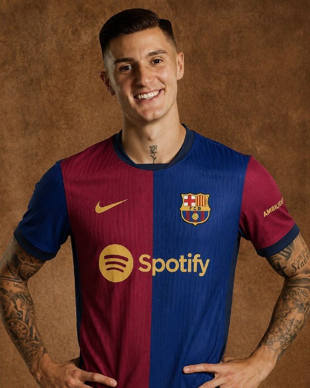 A smiling man with short dark hair and tattooed arms poses in a blue and maroon FC Barcelona jersey featuring the Spotify logo against a brown studio backdrop.