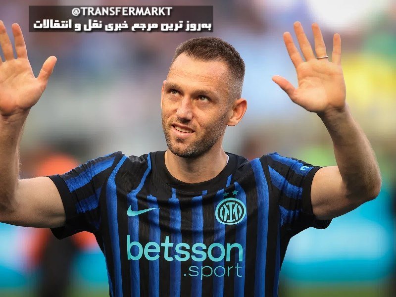 A male soccer player wearing a black and blue striped Inter Milan jersey with "betsson.sport" sponsorship raises both hands toward a stadium crowd.