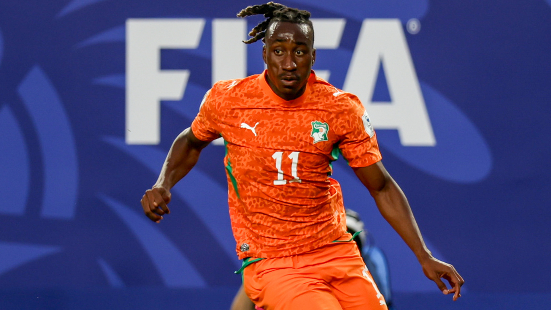 Promotional graphic for a FIFA World Cup 2026 Round of 32 match between Netherlands and Morocco on June 29, 2026, at Monterrey Stadium, featuring two soccer players in orange and red jerseys.