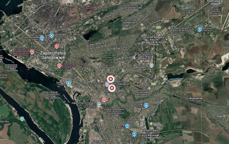 A satellite map displays the city of Zaporizhzhia, Ukraine, with multiple location markers pinpointed across the urban area and surrounding districts.