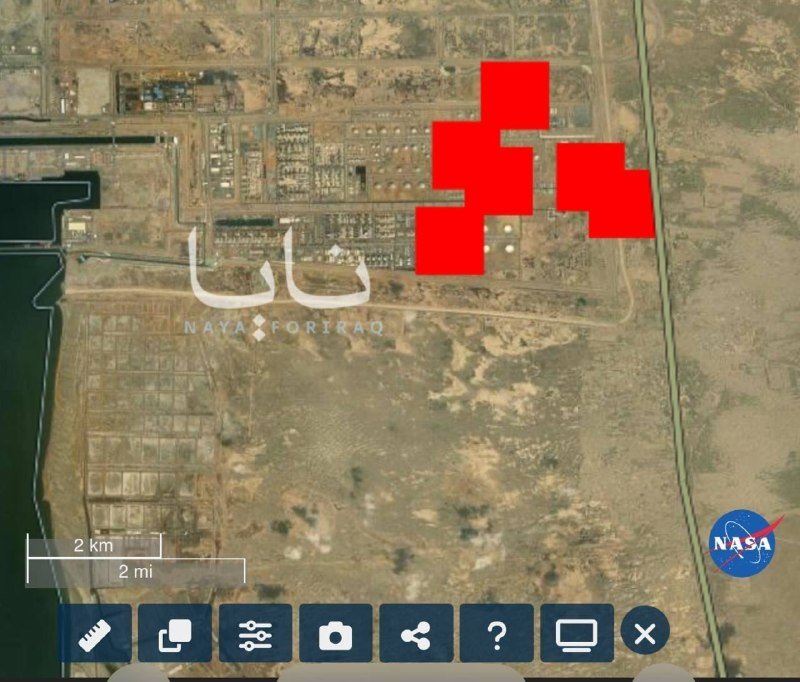 Satellite image showing an industrial facility with red overlay blocks, labeled "NAYA FOR IRAQ," featuring a NASA logo and scale bar.