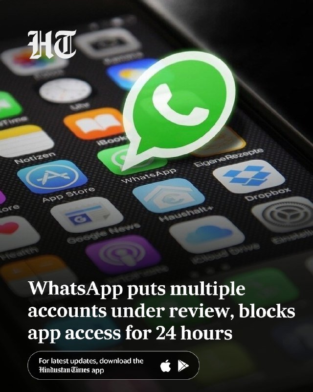 A smartphone screen displays various app icons, with a large green WhatsApp logo superimposed, alongside a headline reading "WhatsApp puts multiple accounts under review, blocks app access for 24 hours."