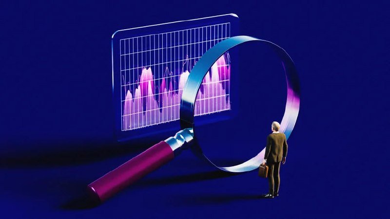 Illustration: a businessman in a suit stands beside a giant magnifying glass examining a bar chart on a blue background.