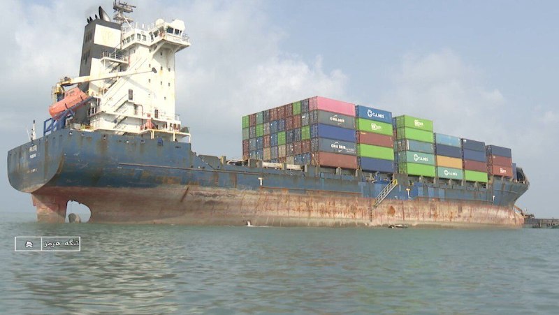 A foreign vessel's grounding on 1 July 2026 has turned a routine navigation dispute into a test of whether Tehran — and the hardliners inside its own system — can be trusted to police the chokepoint while a Geneva accord is being signed.
