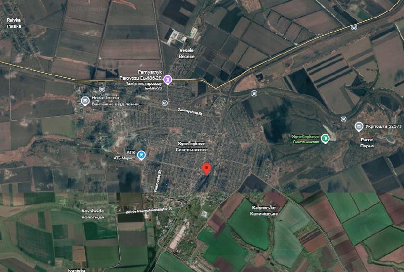 Satellite map view of Synelnykove and surrounding rural areas, marked with labeled road E-50/20, nearby villages, and a red location pin.