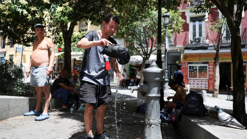 A Reuters webpage headlines "Europe recorded 10,000 excess deaths during late-June heatwave, data show," with an image of a person cooling off under spraying water.
