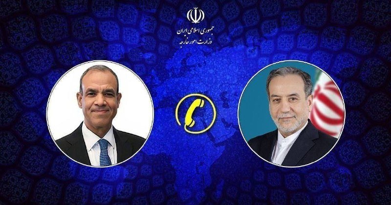 Graphic shows two circular portraits of suited men flanking a yellow telephone icon, with Persian text and Iran's emblem above, against a blue patterned background.