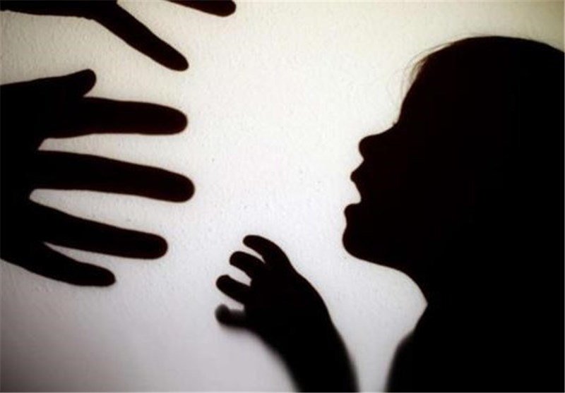 Silhouettes of two large hands and a child's profile are cast against a plain white background, depicting a looming threat.