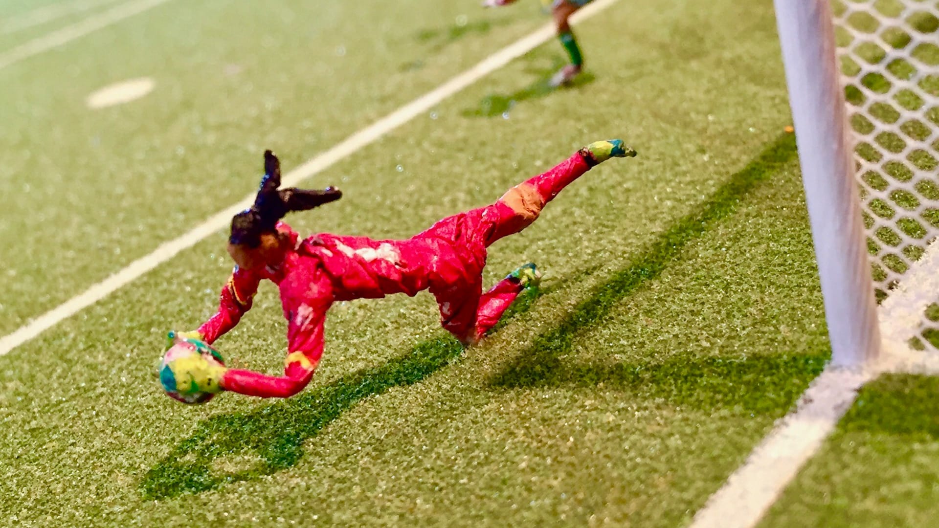 Lyndon Barrois Sr.'s chewing-gum-wrapper portraits treat the World Cup as a political archive — and quietly indict the governing body that would prefer the record rewritten.