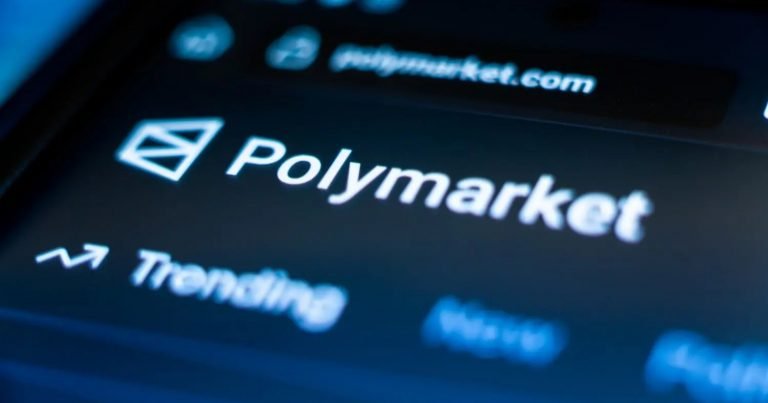 Close-up of a smartphone screen displaying the Polymarket website with a "Trending" section visible.