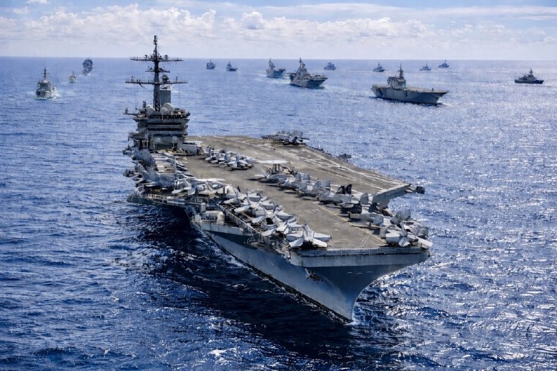 A US carrier group turning toward Iran, an Israeli warning that 'infrastructure will not be spared,' and fresh satellite imagery of rebuilt nuclear sites converged on 10 July 2026 in the most dangerous 24 hours of the year so far.