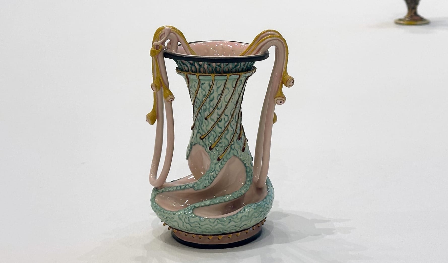 A new exhibition of Kathy Butterly's quasi-vessels — folded, dimpled, furtive little bodies — argues that ceramic sculpture has outgrown its decorative inheritance.