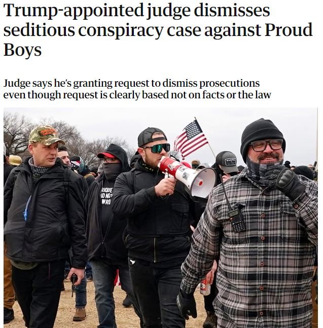 A news headline reads "Trump-appointed judge dismisses seditious conspiracy case against Proud Boys" above a photo of masked individuals, one speaking into a megaphone with an American flag visible.