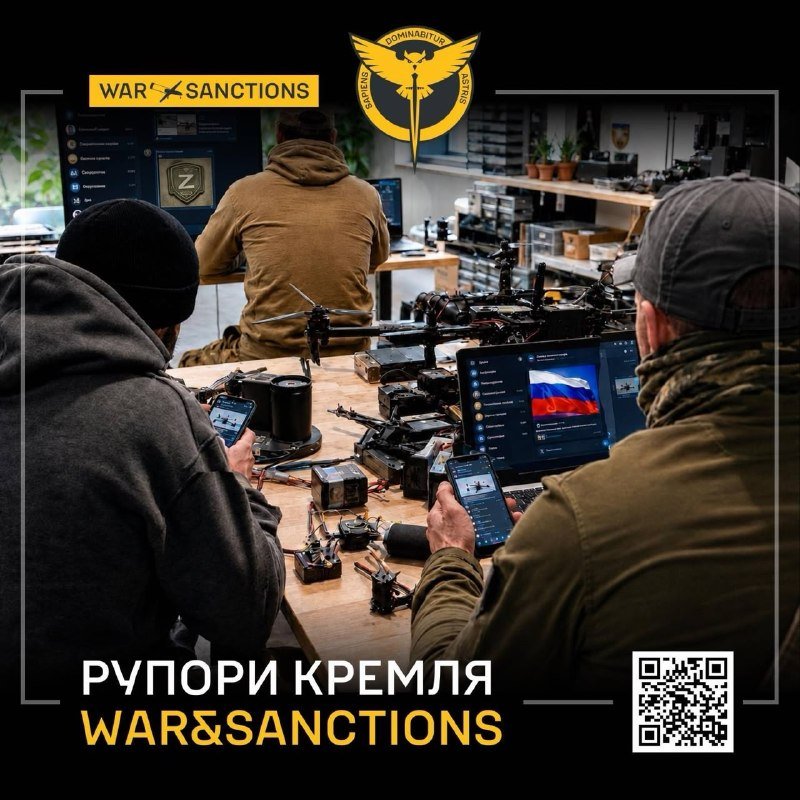 Two individuals sit at a table assembling drone components, with monitors and electronic parts visible, overlaid with "WAR & SANCTIONS" branding and a QR code.