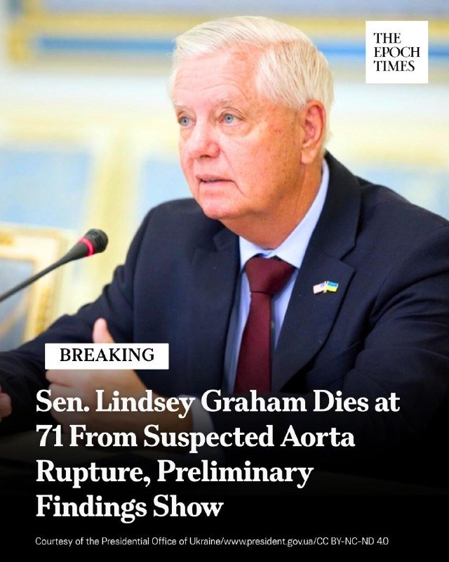 A white-haired man in a dark suit speaks into a microphone, with "THE EPOCH TIMES" logo and a headline reading "BREAKING: Sen. Lindsey Graham Dies at 71 From Suspected Aorta Rupture."
