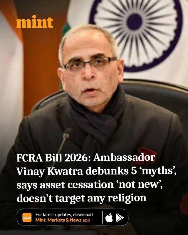 A bespectacled man in dark clothing speaks in front of an Indian flag and the Ashoka Chakra, overlaid with Mint headline text about the FCRA Bill 2026.