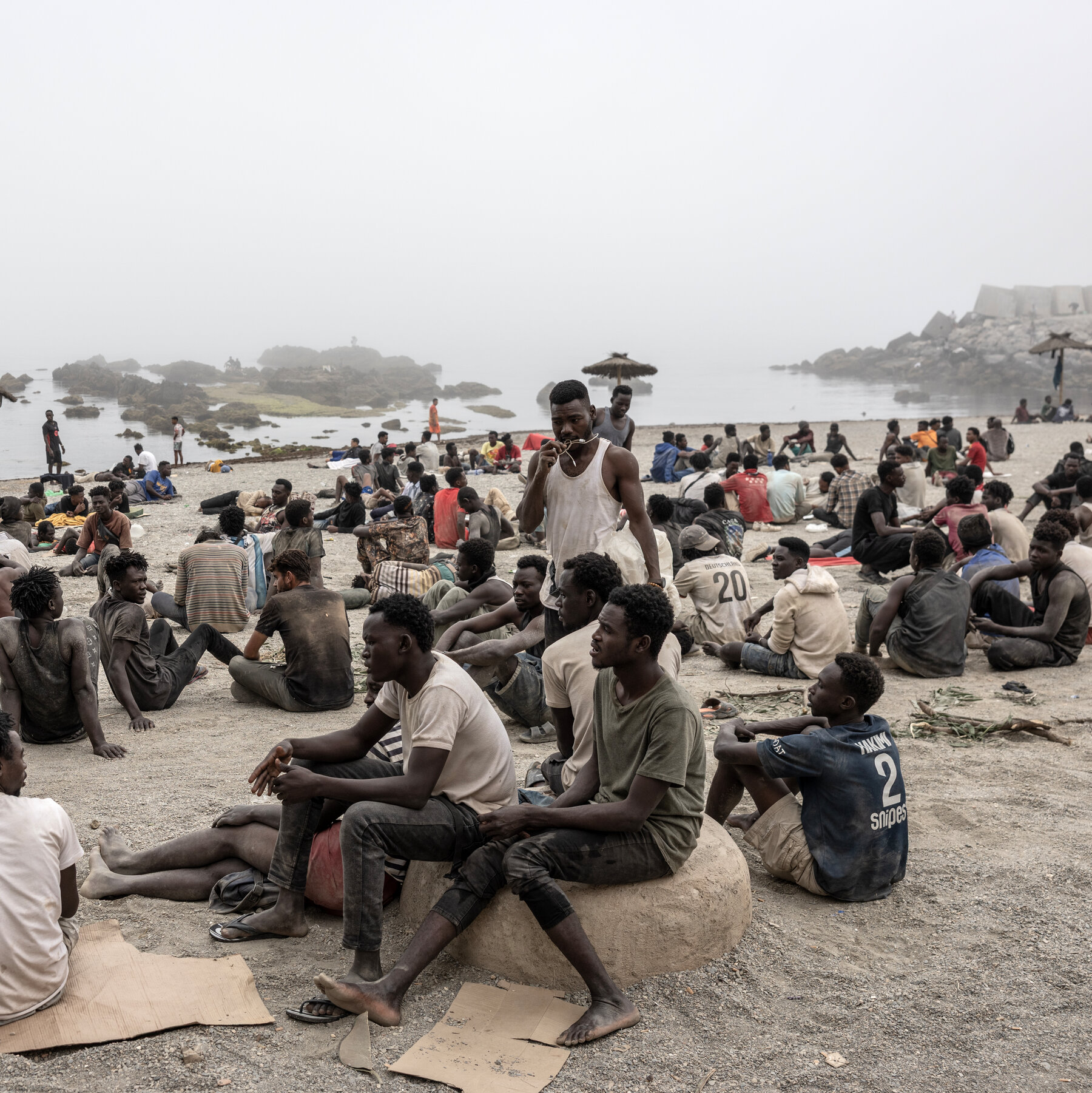 Spain's Interior Ministry estimates roughly 49,000 people crossed from Morocco into Ceuta in 24 hours, with at least 18 reported dead, as Madrid announces a deportation agreement with Rabat.