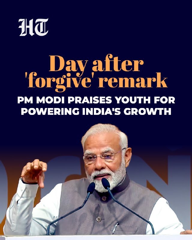 News graphic featuring a bearded man in glasses speaking at a podium, with overlay text reading "Day after 'forgive' remark: PM MODI PRAISES YOUTH FOR POWERING INDIA'S GROWTH."